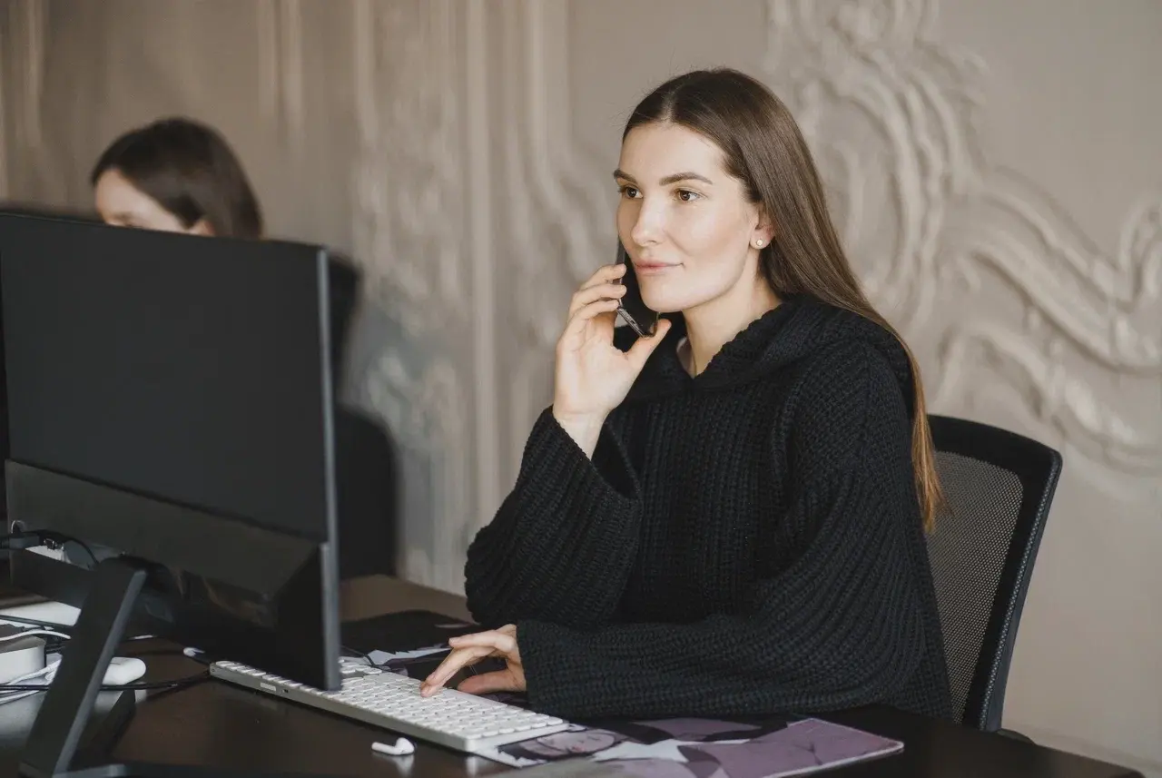 Employee of Gromov Branding at a desk